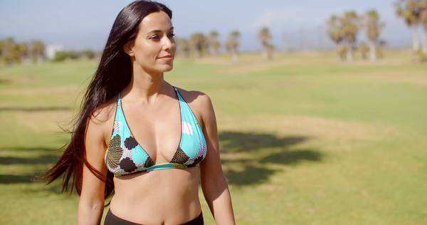 Half Body Shot Of A Long Haired Pretty Woman In Bikini Bra