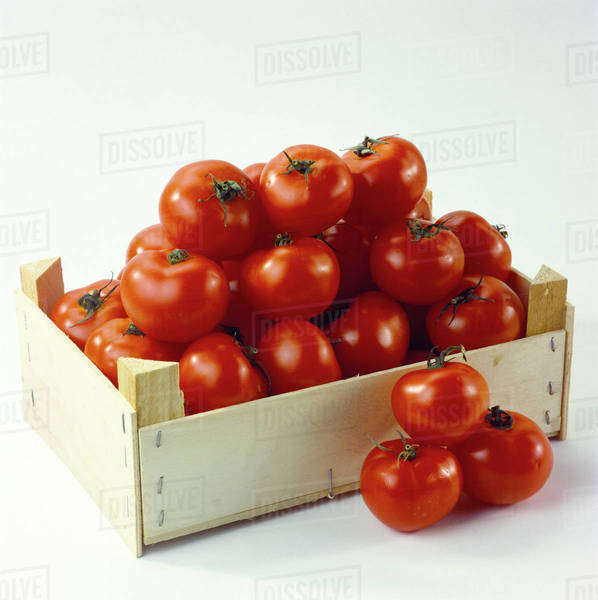 Wooden crate of tomatoes Stock Photo Dissolve