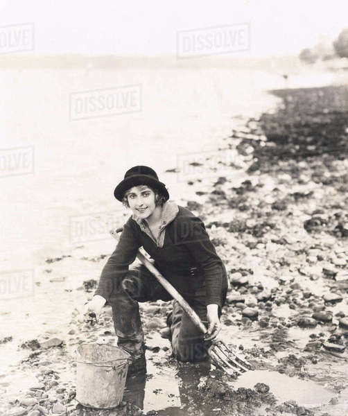 Clam digger Stock Photo Dissolve
