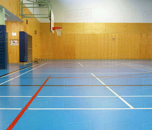 Empty indoor basketball court Stock Photo Dissolve