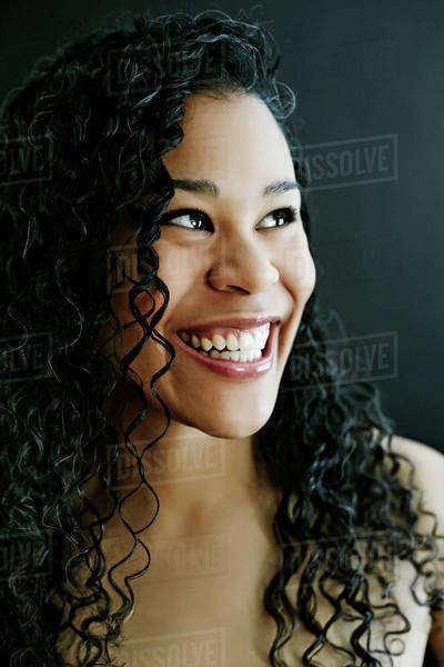 Nude mixed race woman smiling - Royalty-free Stock Photo Dissolve