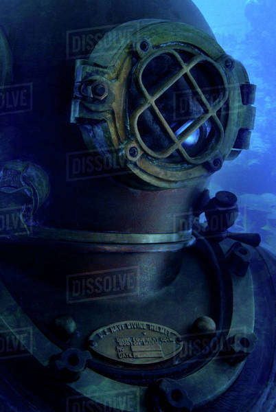 Antique diving suit underwater - Stock Photo - Dissolve