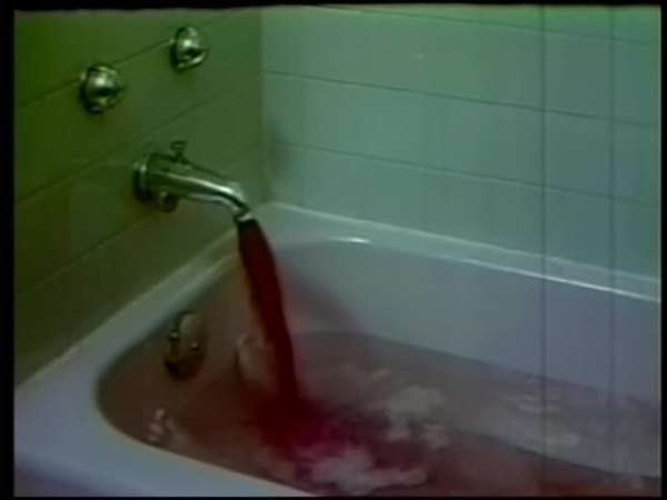 Bathtub Water Coming Out Of Faucet And Turning Red As Person