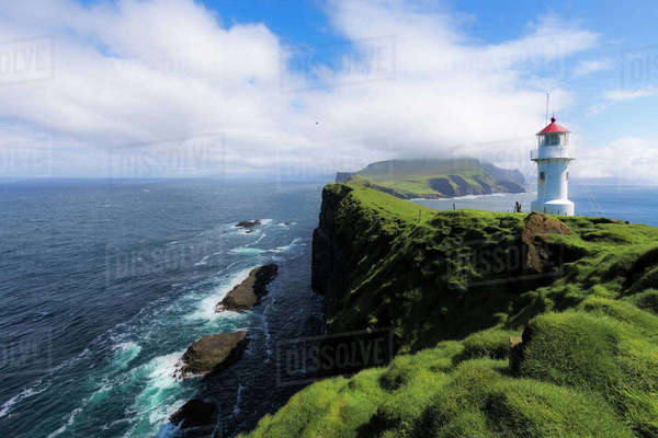 Lighthouse On Islet Known As Mykines Holmur Mykines Island Faroe lighthouse-on-islet-known-as-mykines-holmur-mykines-island-faroe