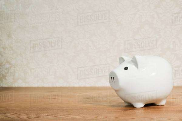 White piggy bank - Stock Photo - Dissolve