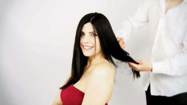 Professional Hair Stylist Doing The Hair Brushing Gorgeous Silky
