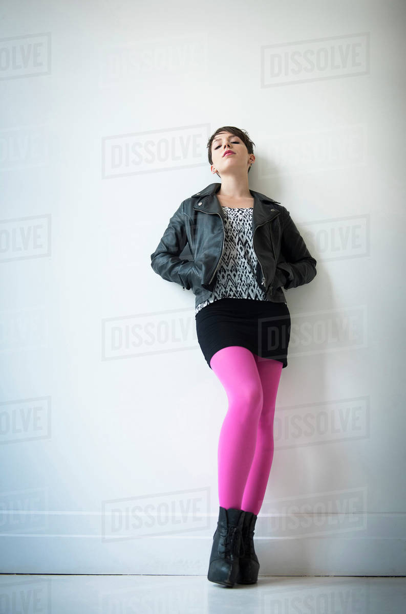 Woman Wearing Leather Jacket Mini Skirt And Ping Tights Stock Woman Wearing Leather Jacket Mini Skirt And Ping Tights