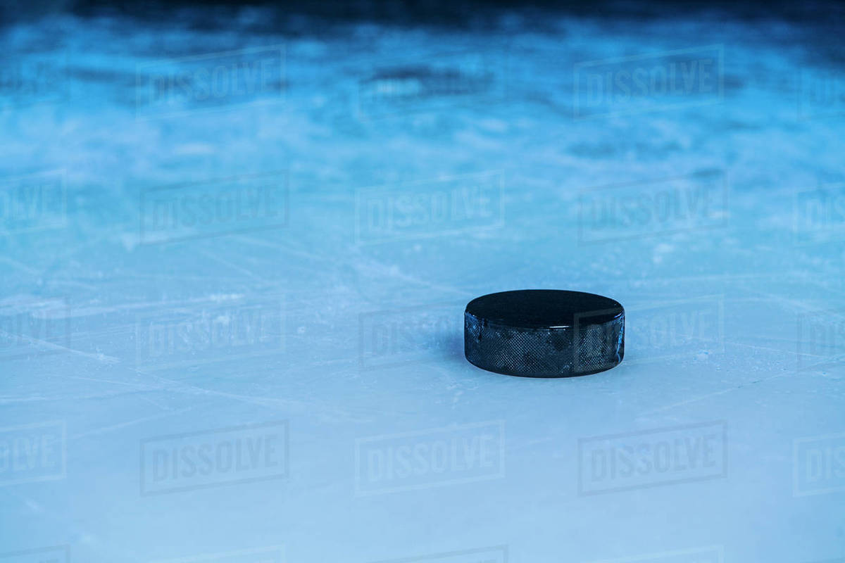Hockey Puck On Ice at Rick Maskell blog