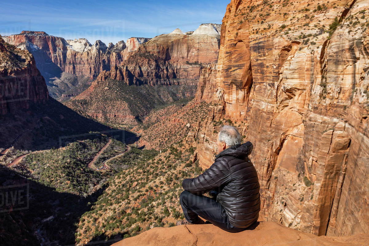 United States, Utah, Zion National Park, Senior man looking over Zion