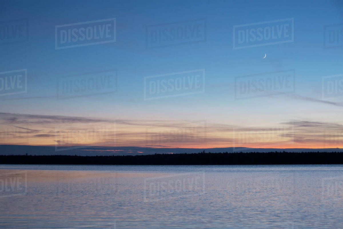 Usa, Maine, Cooper, Sunset at Cathance Lake Stock Photo Dissolve