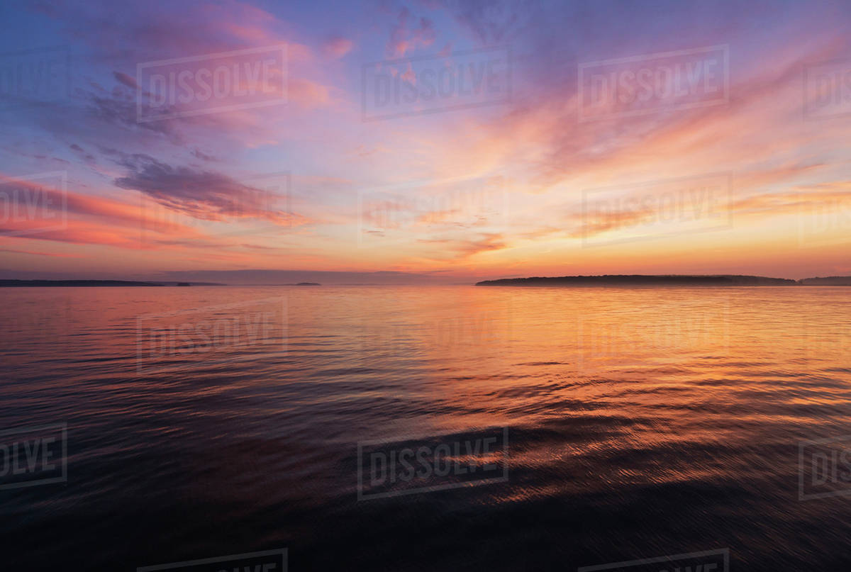 Colorful seascape at sunrise - Royalty-free Stock Photo | Dissolve