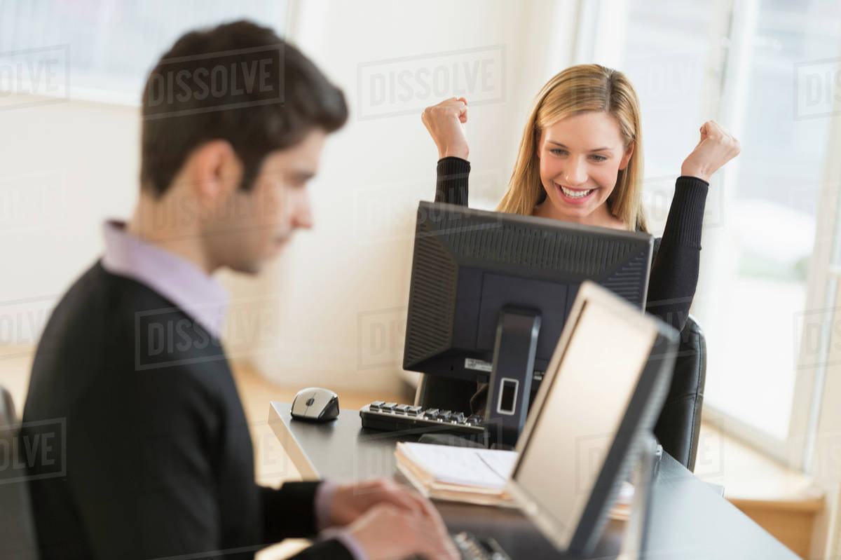 Business man and woman working in office - Royalty-free Stock Photo ...