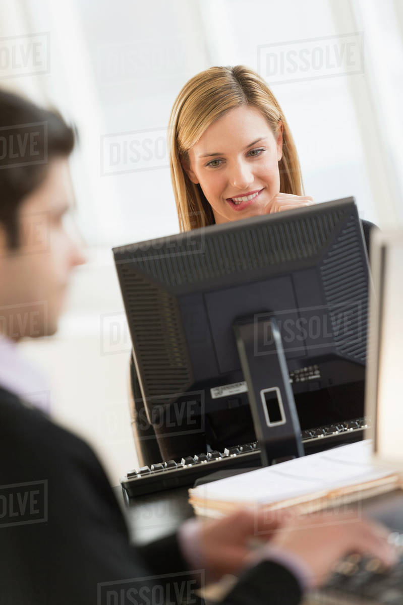 Business man and woman working in office - Royalty-free Stock Photo ...