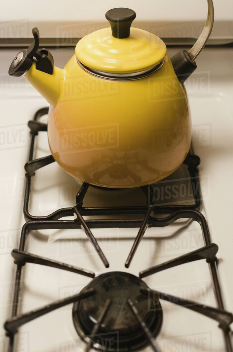 Kettle on stove Stock Photo Dissolve