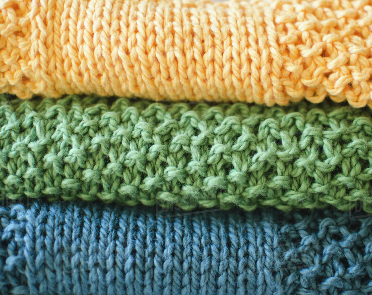Stack of knitted blankets Stock Photo Dissolve