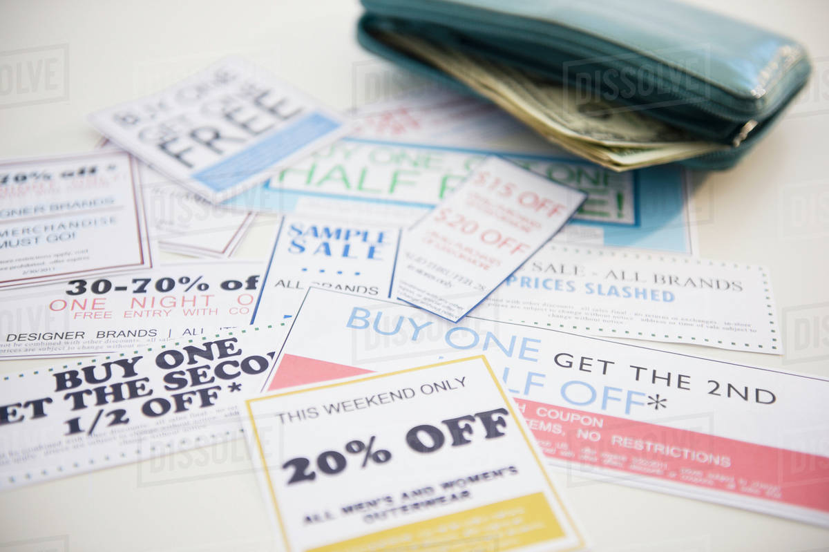 wallet and discount offer leaflets stock photo dissolve discount leaflets