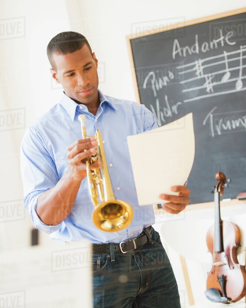 Music Teacher With Trombone Stock Photo Dissolve