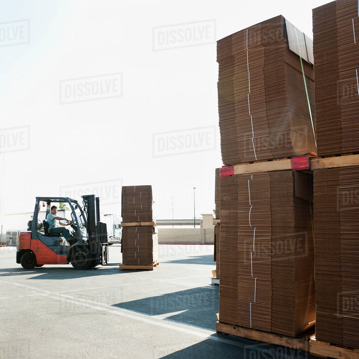 Forklift truck moving pallets Stock Photo Dissolve