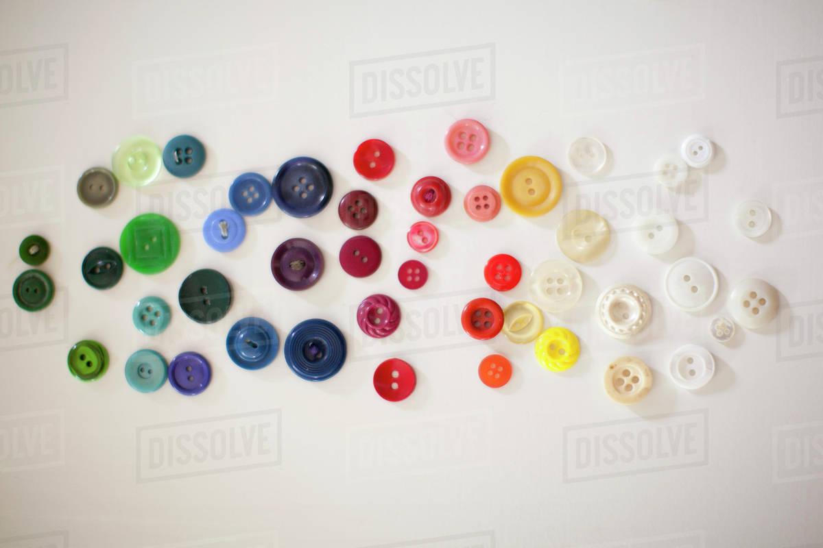 Colorful buttons on white background - Stock Photo - Dissolve