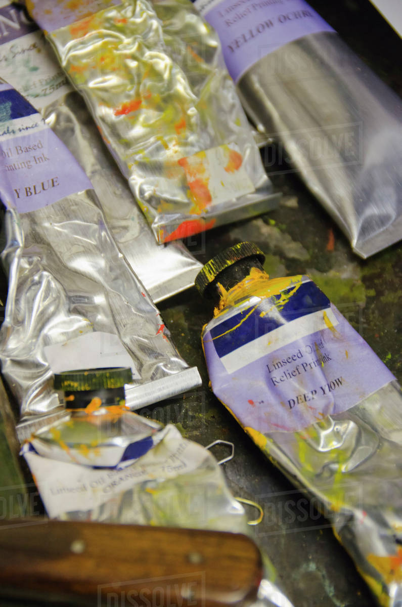 Close up of printer's ink in tubes Stock Photo Dissolve