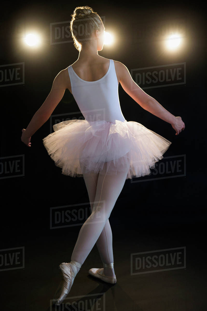 Rear view of teenage (16-17) ballerina on stage - Royalty-free Stock ...