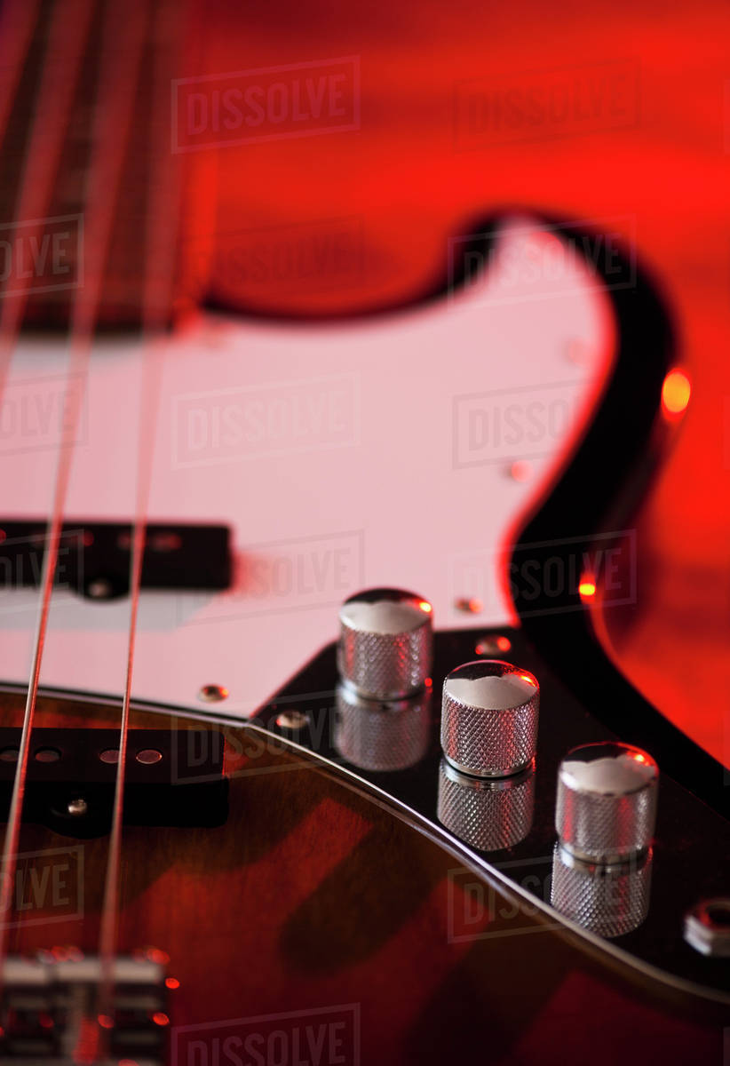 Close up of volume knobs of bass guitar Stock Photo Dissolve