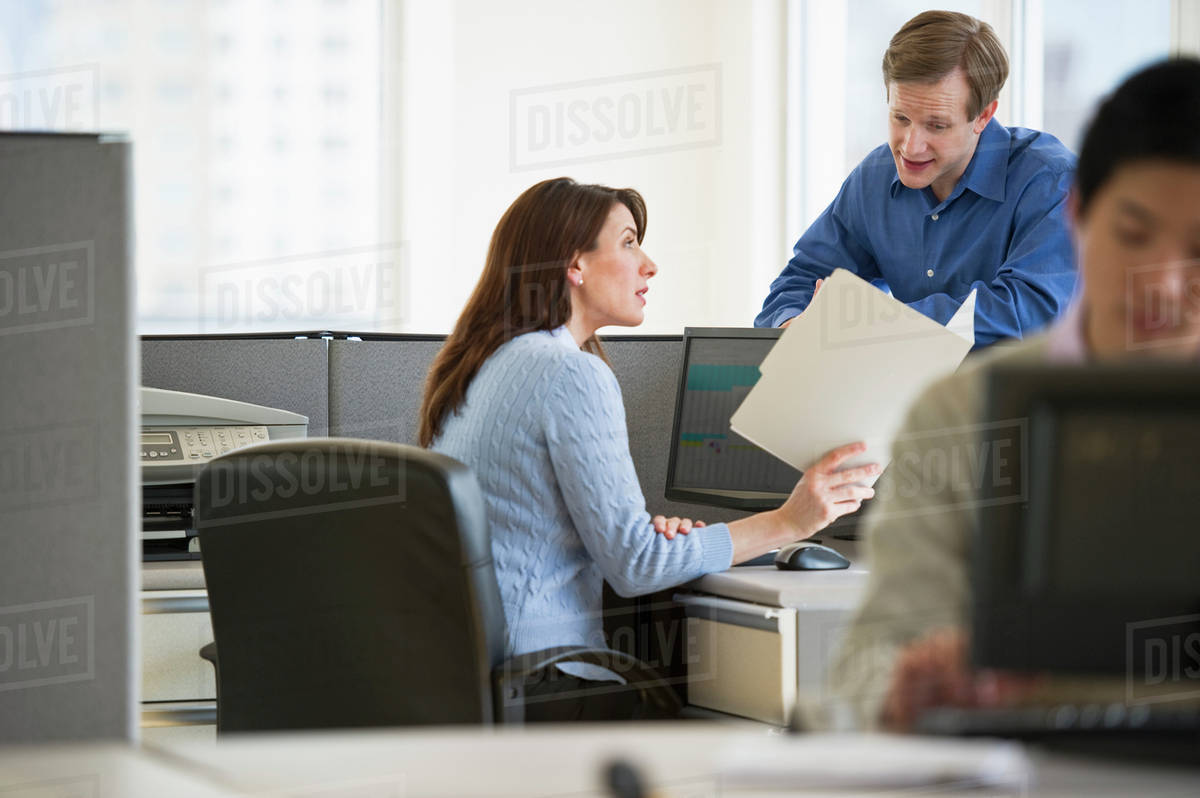 Office workers in cubicles Stock Photo Dissolve