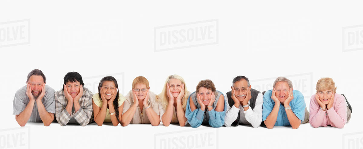 A Group Of People Lying On The Floor In A Row Stock Photo Dissolve