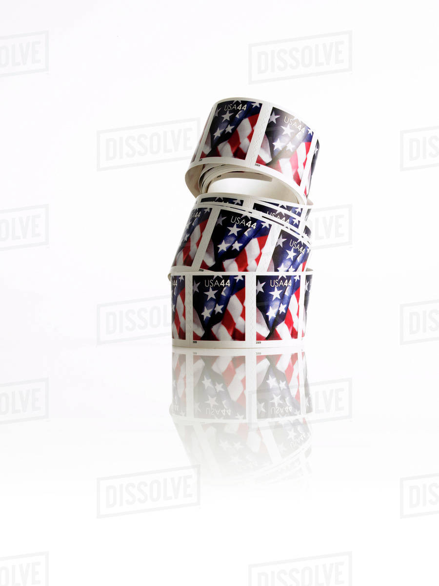 Roll of American postage stamps Stock Photo Dissolve