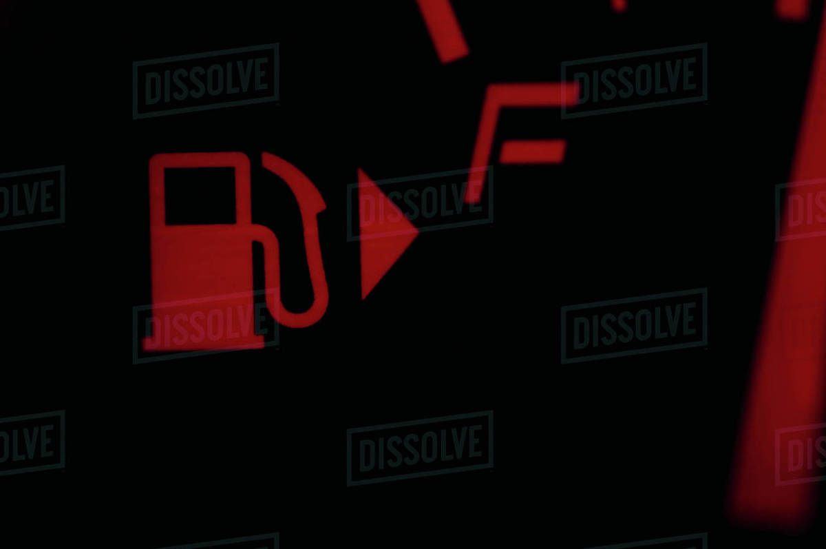 Gas gauge in a car Stock Photo Dissolve