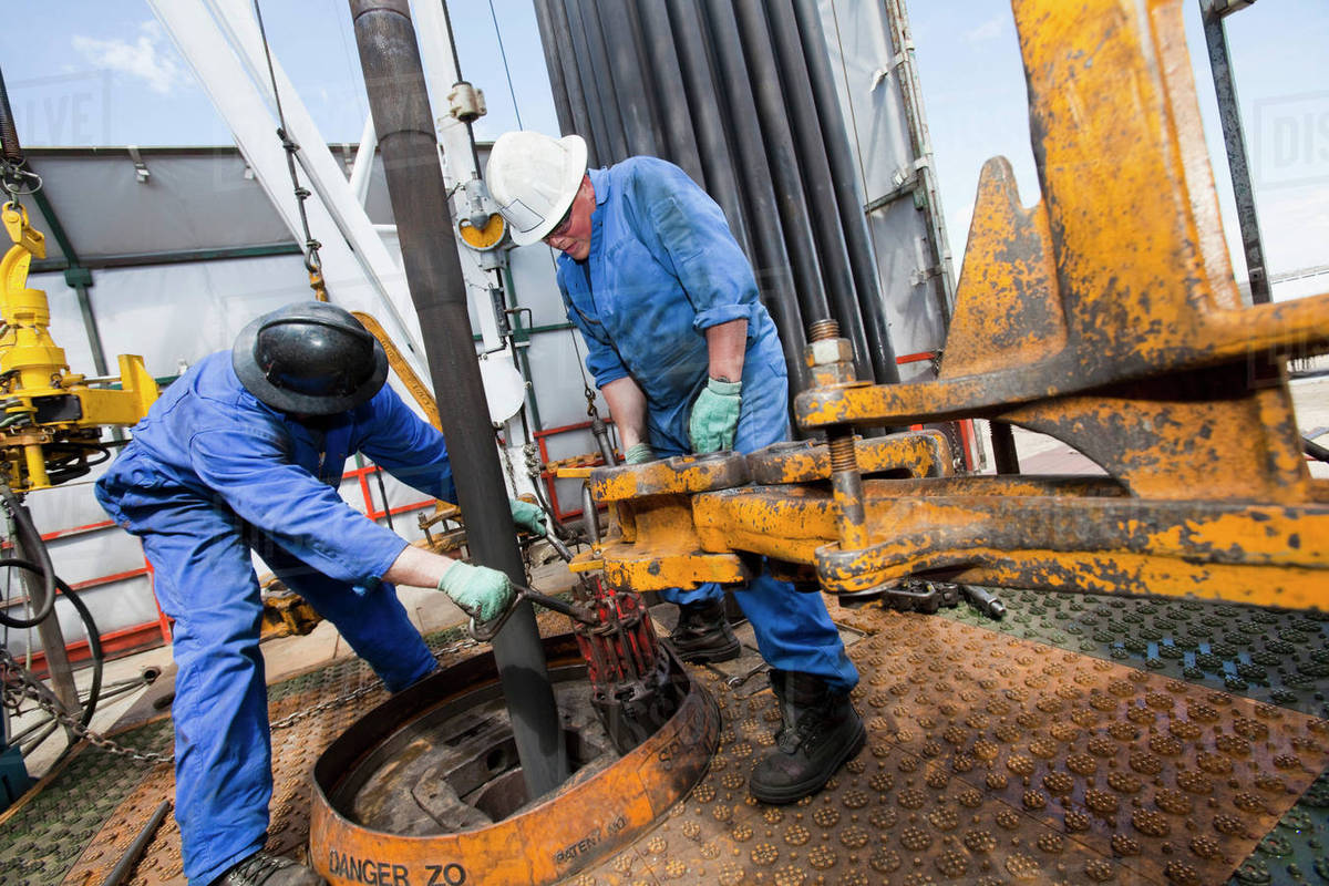 Industrial workers Stock Photo Dissolve