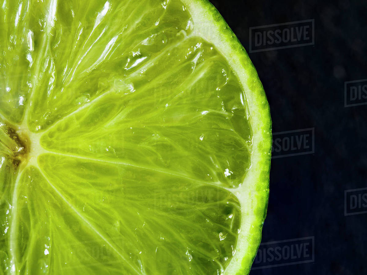 Halved green lime Stock Photo Dissolve