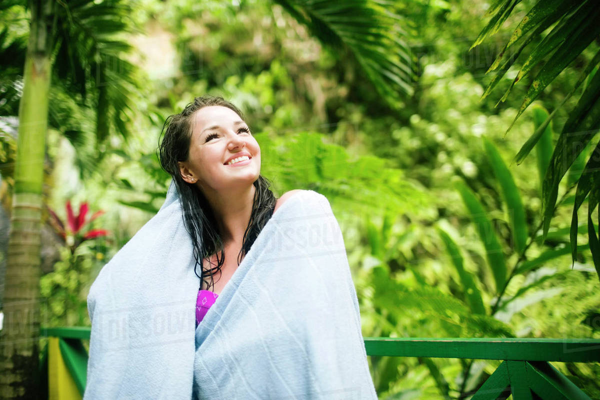 Caribbean Islands, Saint Lucia, Woman with wet hair wrapped in towel