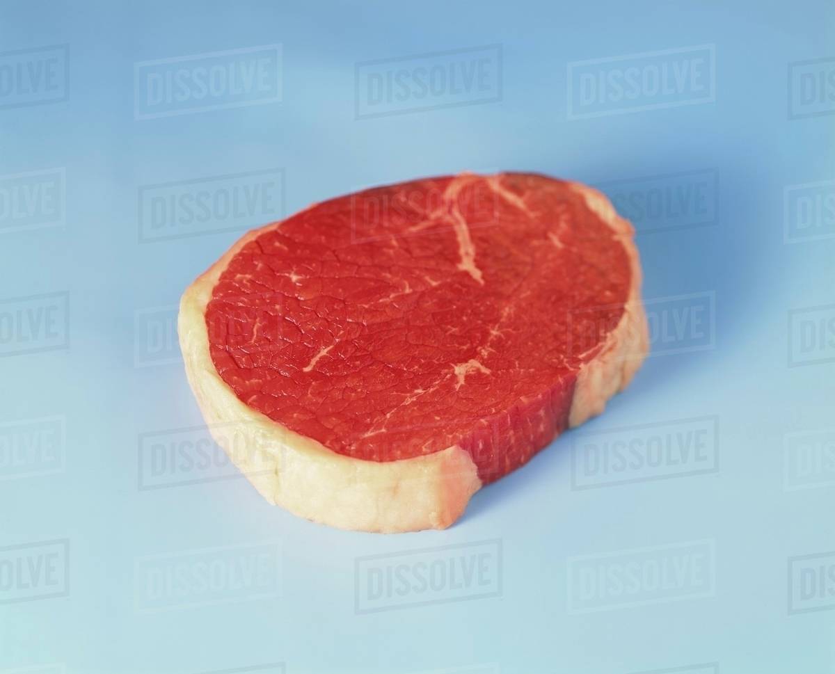 Beefsteak with a layer of fat Stock Photo Dissolve