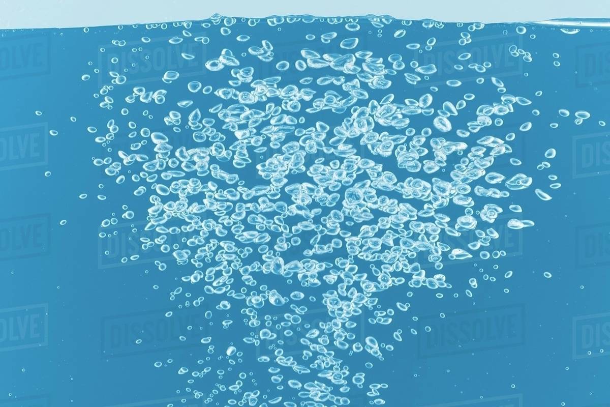 Air bubbles in blue water Stock Photo Dissolve