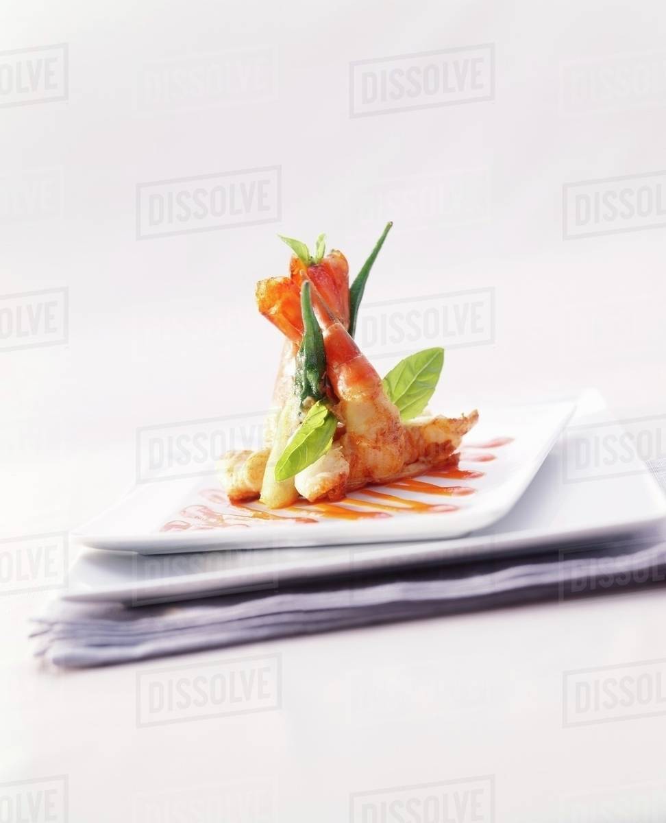 Fried prawns with okra pods in tempura batter Stock Photo Dissolve