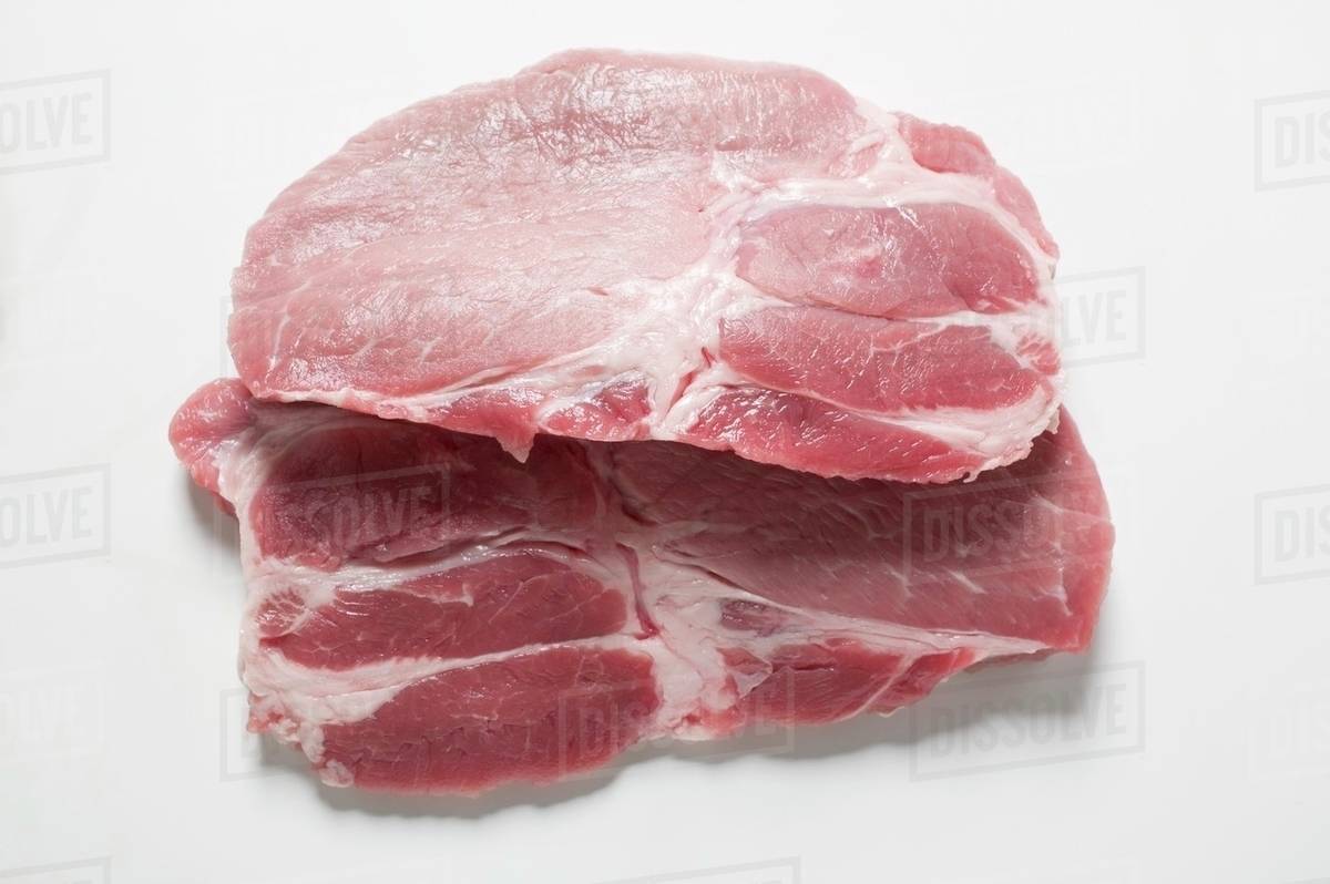 Pork collar steaks Stock Photo Dissolve