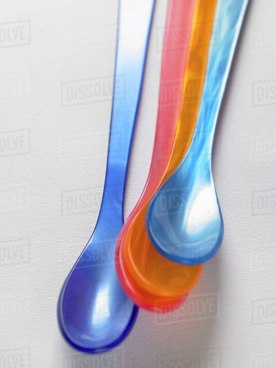 Plastic egg spoons Stock Photo Dissolve