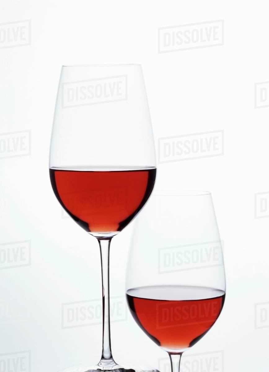 Two glasses of red wine Stock Photo Dissolve