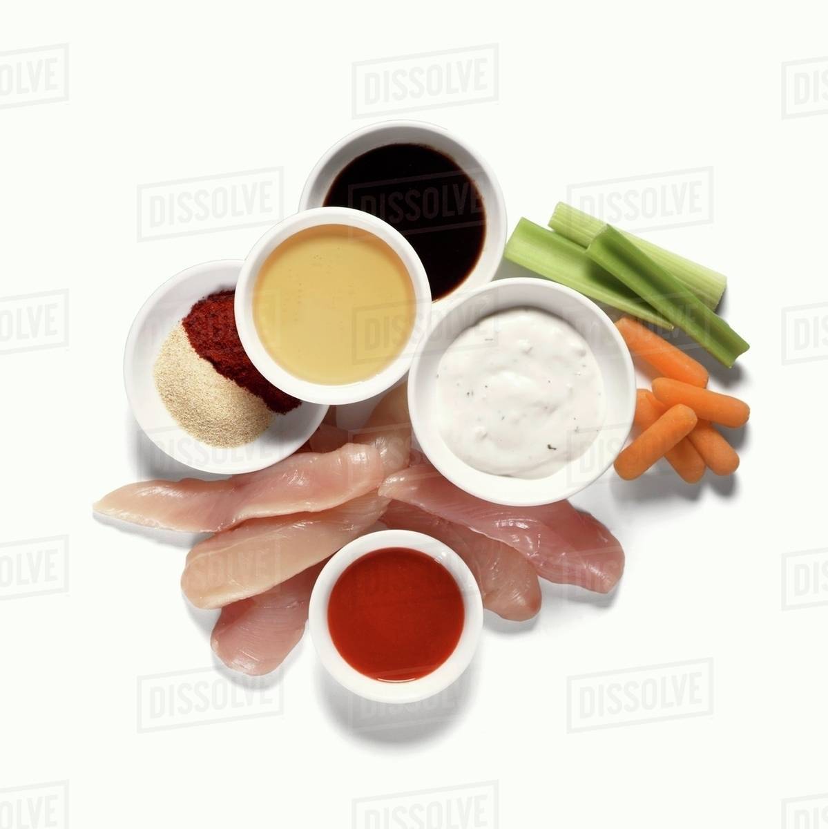 Uncooked Chicken with Condiments and Veggies - Royalty-free Stock Photo ...