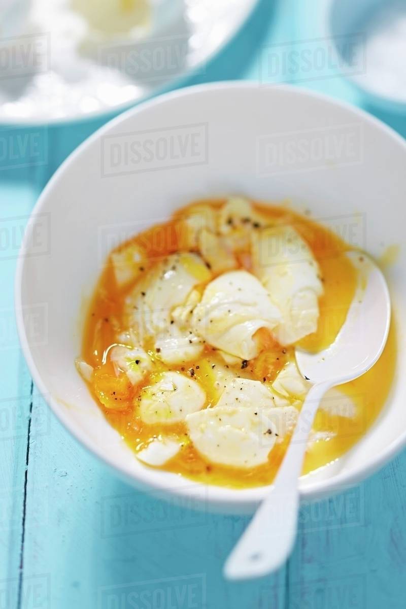 Quark with honey for breakfast Stock Photo Dissolve