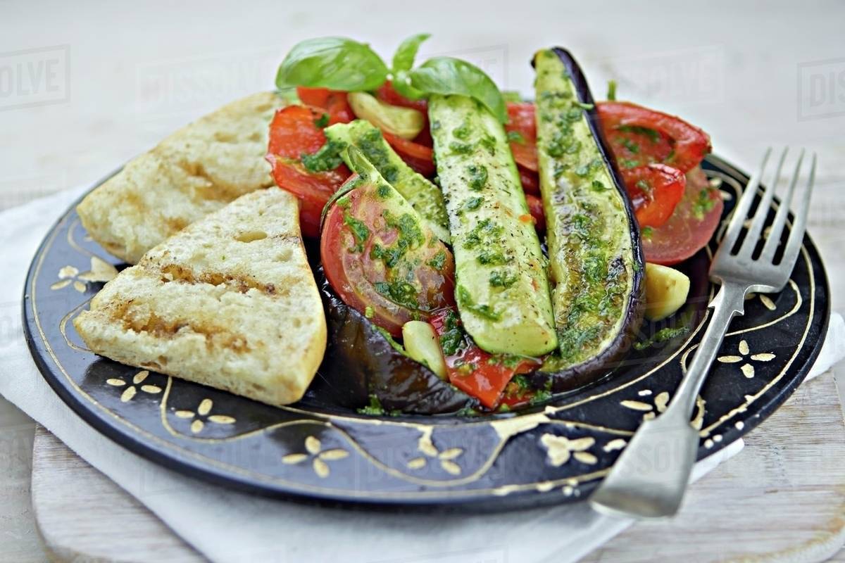 Ratatouille with grilled bread Stock Photo Dissolve