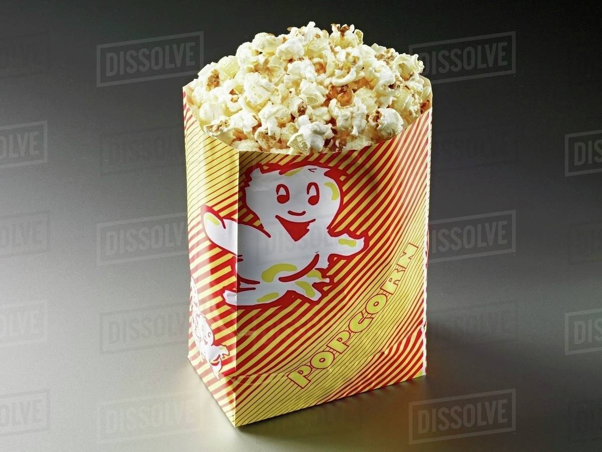 Popcorn In A Paper Bag Stock Photo