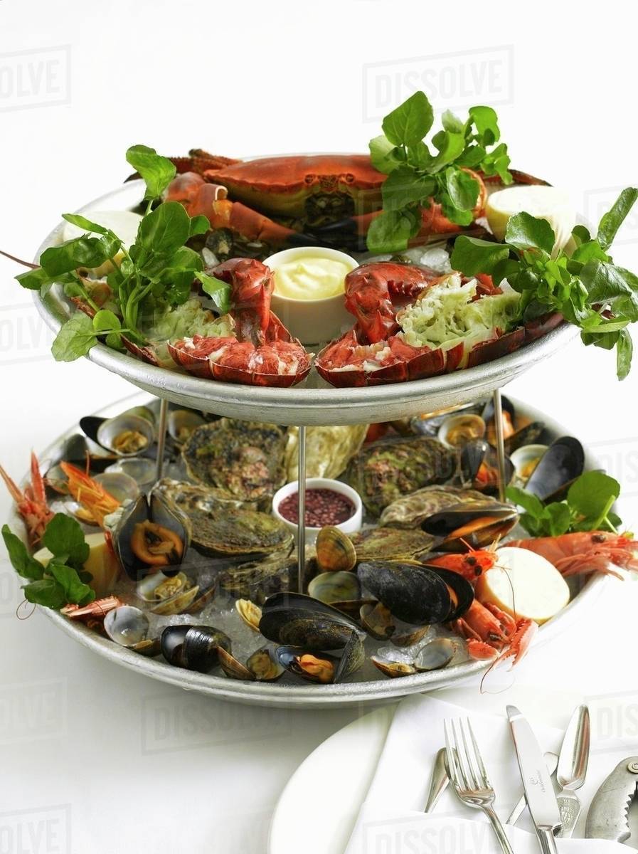 Seafood platter with dips and salad Stock Photo Dissolve