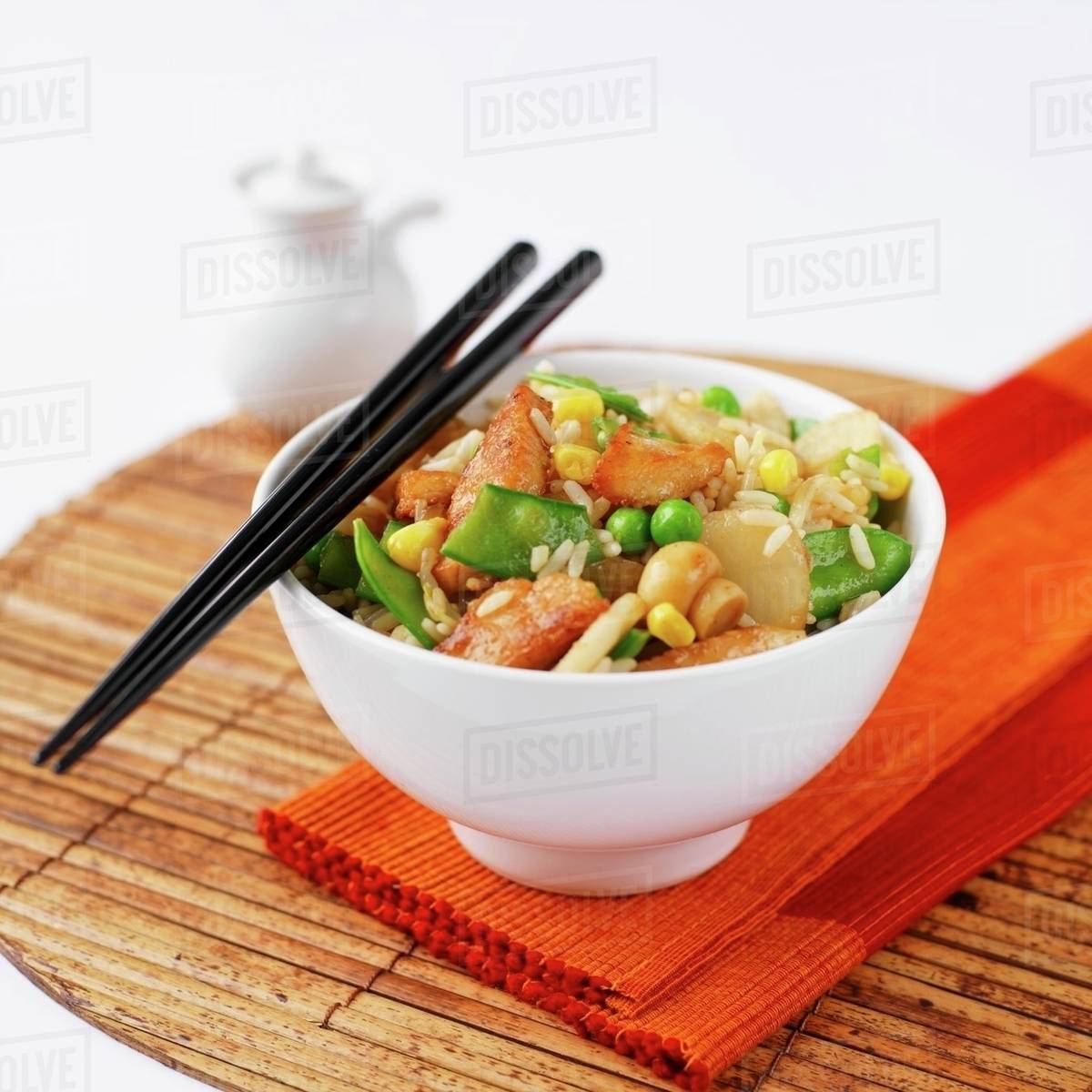Chicken stirfry with peas, mushrooms and rice (Asia) Stock Photo