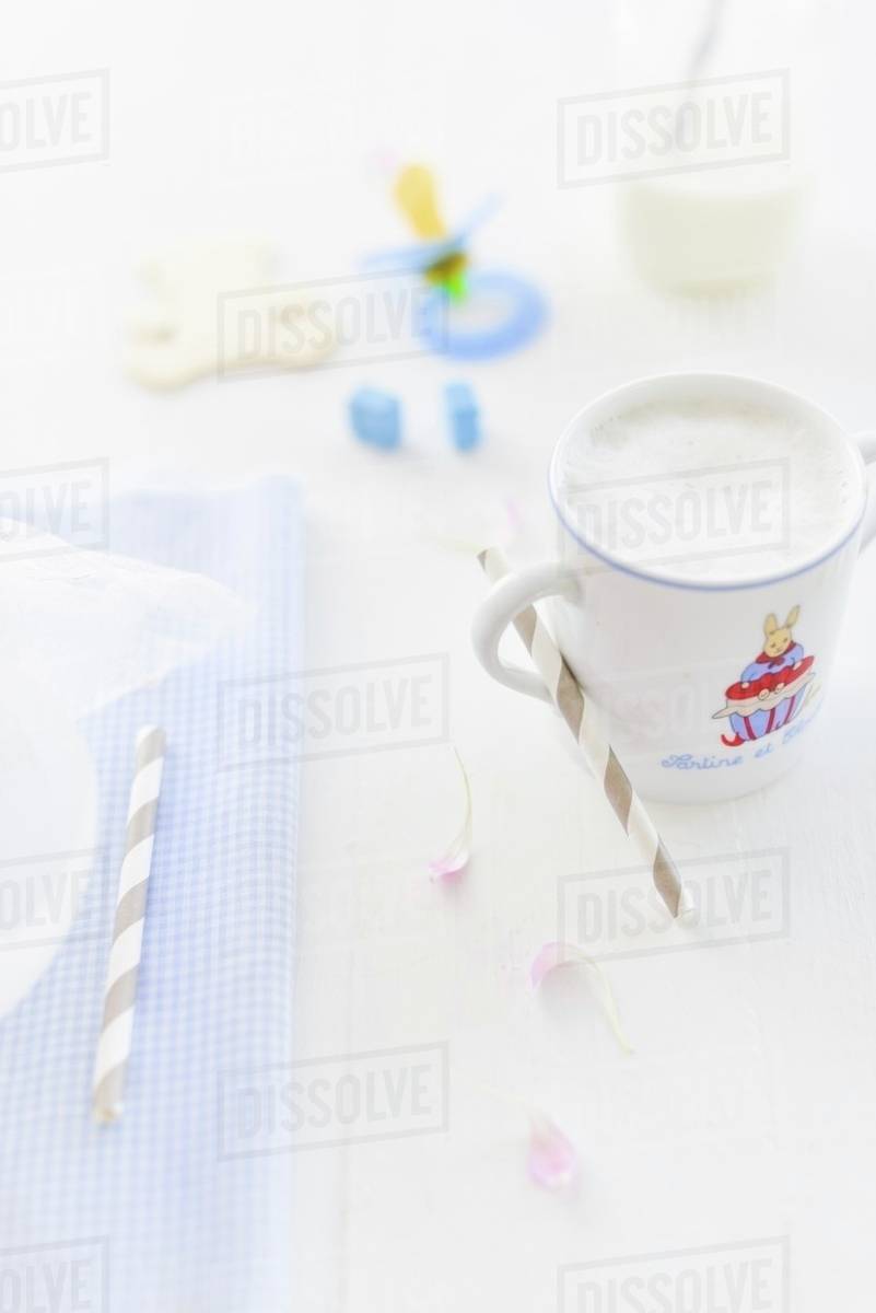Baby milk in a beaker Stock Photo Dissolve
