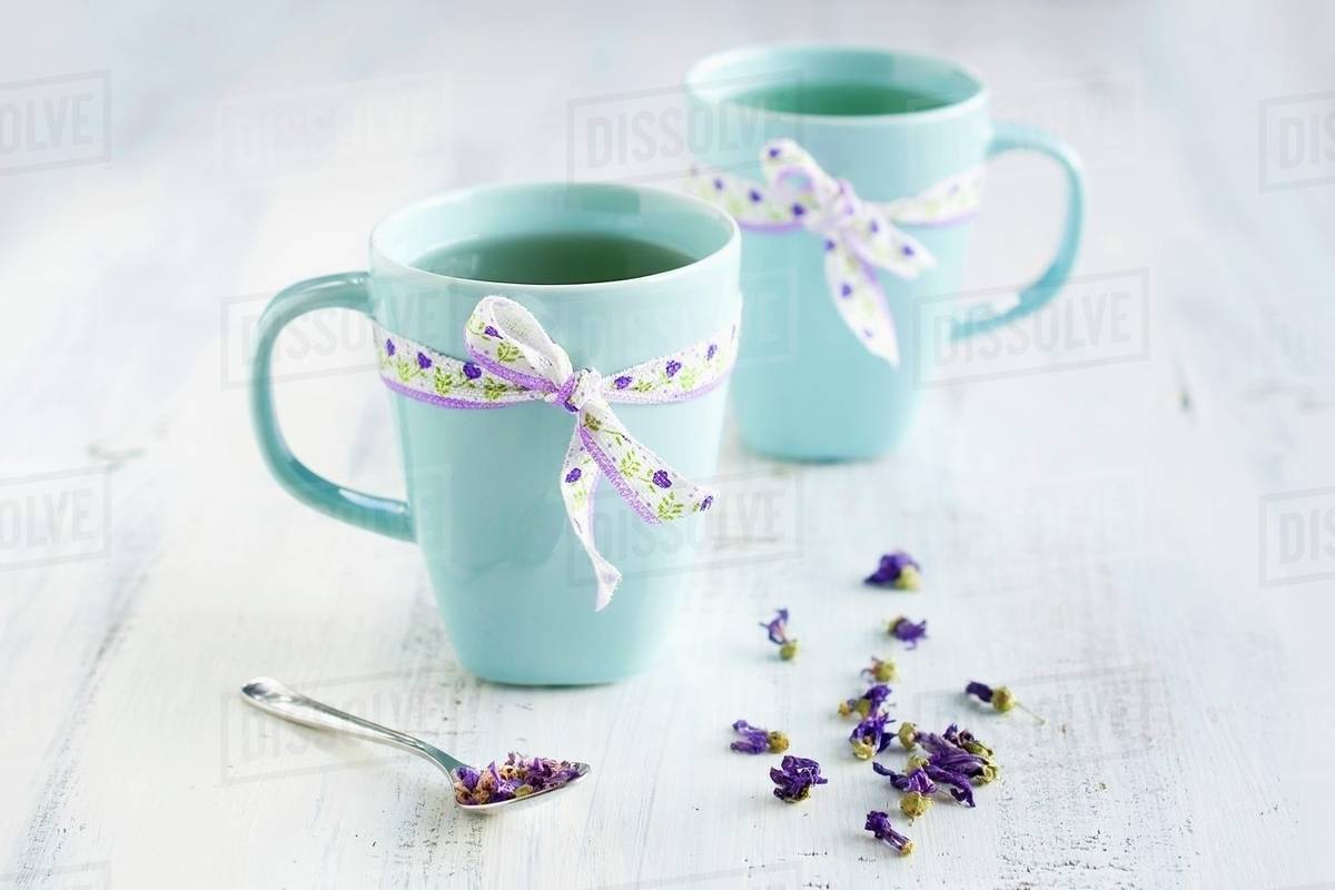 Mallow Tea In Two Light Blue Cups Stock Photo Dissolve
