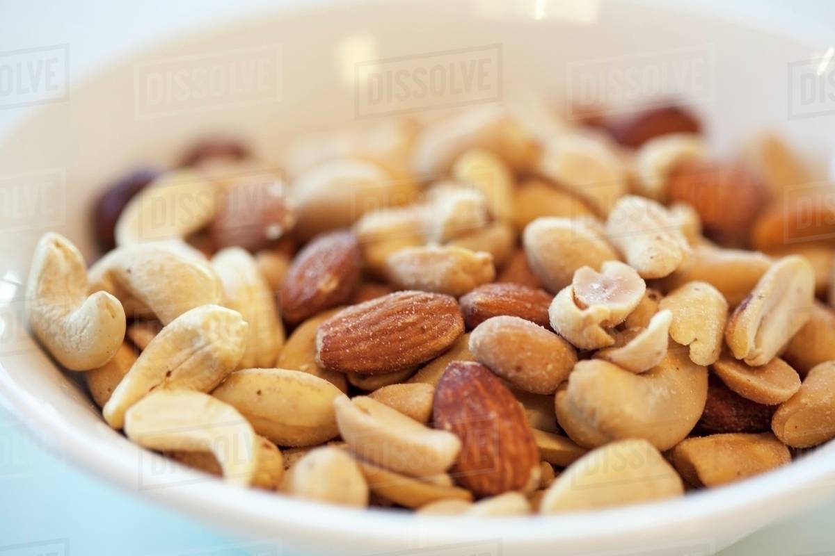 Roasted salted mixed nuts Stock Photo Dissolve