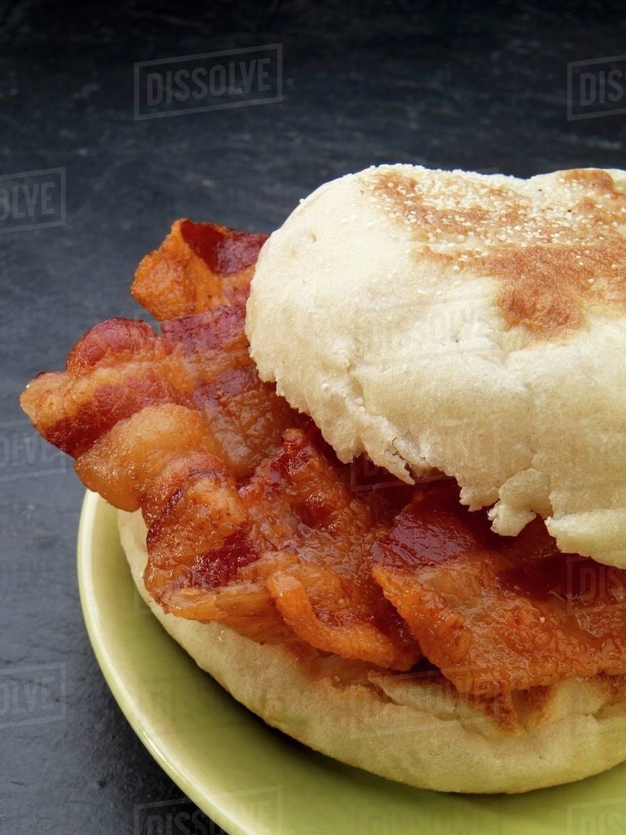 An English muffin with bacon (USA) Stock Photo Dissolve