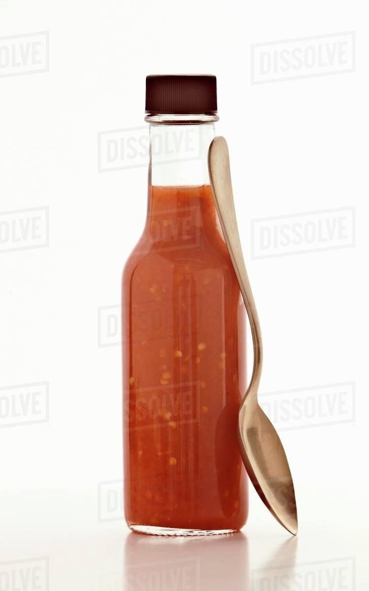 Hot chili sauce Stock Photo Dissolve